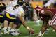 GLENDALE, AZ - JANUARY 02: Center Mike Dent #68 of the West Virginia Mountaineers gets ready to snap the ball against the Oklahoma Sooners at the Tostito's Fiesta Bowl at University of Phoenix Stadium January 2, 2008 in Glendale, Arizona. (Photo by Doug Pensinger/Getty Images)