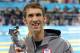 LONDON, ENGLAND - AUGUST 04: Michael Phelps of the United States poses with a special award presented by FINA for his career achievements on Day 8 of the London 2012 Olympic Games at the Aquatics Centre on August 4, 2012 in London, England. (Photo by Jeff Gross/Getty Images)
