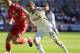 SWANSEA, WALES - MAY 13: Joe Allen of Swansea City battles with Jordan Henderson of Liverpool during the Barclays Premier League match between Swansea City and Liverpool at the Liberty Stadium on May 13, 2012 in Swansea, Wales. (Photo by Bryn Lennon/Getty Images)