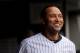 NEW YORK, NY - MARCH 31: Derek Jeter #2 of the New York Yankees smiles as he looks on from the dugout during the game against the Detroit Tigers on Opening Day at Yankee Stadium on March 31, 2011 in New York City. (Photo by Nick Laham/Getty Images)