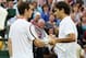 LONDON, ENGLAND - JULY 08: Roger Federer of Switzerland (R) shakes hands with Andy Murray of Great Britain after defeating him during their Gentlemen's Singles final match on day thirteen of the Wimbledon Lawn Tennis Championships at the All England Lawn Tennis and Croquet Club on July 8, 2012 in London, England. (Photo by Clive Brunskill/Getty Images)