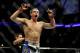 Apr 21, 2012; Atlanta, GA, USA; Rory MacDonald celebrates beating Chad Mills in a welterweight bout during UFC 145 at Philips Arena. MacDonald won the bout by technical knock out. Mandatory Credit: Paul Abell-US PRESSWIRE