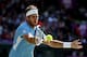 LONDON, ENGLAND - AUGUST 03: Juan Martin Del Potro of Argentina returns a shot in the third set against Roger Federer of Switzerland in the Semifinal of Men's Singles Tennis on Day 7 of the London 2012 Olympic Games at Wimbledon on August 3, 2012 in London, England. Federer defeated Del Potro 4-6, 7-6, 19-17. (Photo by Clive Brunskill/Getty Images)