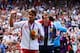 LONDON, ENGLAND - AUGUST 05: Silver medalist Roger Federer (L) of Switzerland, gold medalist Andy Murray (R) of Great Britain celebrate during the medal ceremony for the Men's Singles Tennis match on Day 9 of the London 2012 Olympic Games at the All England Lawn Tennis and Croquet Club on August 5, 2012 in London, England. Murray defeated Federer in the gold medal match in straight sets 2-6, 1-6, 4-6. (Photo by Clive Brunskill/Getty Images)