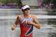 LONDON, ENGLAND - AUGUST 04: Paula Findlay of Canada competes in the running stage of the Women's Triathlon event at the London 2012 Olympic Games in Hyde Park which was won by Nicola Spirig of Switzerland on August 4, 2012 in London, England. (Photo by Oli Scarff/Getty Images)