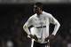 LONDON, ENGLAND - MARCH 04: Dejected Emmanuel Adebayor of Tottenham Hotspur during the Barclays Premier League match between Tottenham Hotspur and Manchester United at White Hart Lane on March 4, 2012 in London, England. (Photo by Mike Hewitt/Getty Images)