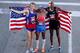 HOUSTON, TX - JANUARY 14: (L-R) Ryan Hall, Meb Keflezighi and Abdi Abdirahman celebrate holding the American flag after they competed in the U.S. Marathon Olympic Trials January 14, 2012 in Houston, Texas. (Photo by Thomas B. Shea/Getty Images)
