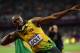 LONDON, ENGLAND - AUGUST 05: Usain Bolt of Jamaica celebrates winning gold in the Men's 100m Final on Day 9 of the London 2012 Olympic Games at the Olympic Stadium on August 5, 2012 in London, England.(Photo by Julia Vynokurova/Getty Images)