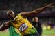 LONDON, ENGLAND - AUGUST 05: Usain Bolt of Jamaica celebrates winning gold in the Men's 100m Final on Day 9 of the London 2012 Olympic Games at the Olympic Stadium on August 5, 2012 in London, England.(Photo by Julia Vynokurova/Getty Images)