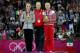 LONDON, ENGLAND - AUGUST 05: Silver medallist Mc Kayla Maroney (L) of the United States, gold medallist Sandra Raluca Izbasa (C) of Romania and bronze medallist Maria Paseka of Russia pose with their medals during the medal ceremony following the Artistic Gymnastics Women's Vault final on Day 9 of the London 2012 Olympic Games at North Greenwich Arena on August 5, 2012 in London, England. (Photo by Ronald Martinez/Getty Images)