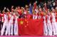 LONDON, ENGLAND - AUGUST 05: The China Badminton team celebrate their 5 Gold Medals following the Men's Doubles Badminton Gold Medal match on Day 9 of the London 2012 Olympic Games at Wembley Arena on August 5, 2012 in London, England. (Photo by Michael Regan/Getty Images)