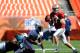 Aug. 4, 2012; Miami, FL, USA; Miami Dolphins quarterback Ryan Tannehill (17) runs during a scrimmage at Sun Life Stadium. Mandatory Credit: Steve Mitchell-US PRESSWIRE