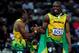 LONDON, ENGLAND - AUGUST 05: Silver medalist Yohan Blake of Jamaica celebrates with Usain Bolt of Jamaica on winning gold in the Mens 100m Final on Day 9 of the London 2012 Olympic Games at the Olympic Stadium on August 5, 2012 in London, England. (Photo by Stu Forster/Getty Images)