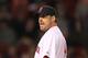BOSTON, MA - SEPTEMBER 19: John Lackey #41 of the Boston Red Sox reacts as manager Terry Francona, not seen, walks to mound to remove Lacey during a game with the Baltimore Orioles in the second game of a doubleheader at Fenway Park September 19, 2011 in Boston, Massachusetts. (Photo by Jim Rogash/Getty Images)
