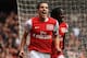 LONDON, ENGLAND - MAY 05: Robin van Persie of Arsenal celebrates scoring their third goal during the Barclays Premier League match between Arsenal and Norwich City at the Emirates Stadium on May 5, 2012 in London, England. (Photo by Bryn Lennon/Getty Images)