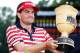 AKRON, OH - AUGUST 05: Keegan Bradley celebrates with the Gary Player cup during the trophy presentation after winning the World Golf Championships-Bridgestone Invitational at Firestone Country Club South Course on August 5, 2012 in Akron, Ohio. (Photo by Gregory Shamus/Getty Images)