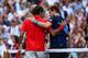 LONDON, ENGLAND - AUGUST 05: Andy Murray of Great Britain speaks with Roger Federer of Switzerland at the net after the Men's Singles Tennis Gold Medal Match on Day 9 of the London 2012 Olympic Games at the All England Lawn Tennis and Croquet Club on August 5, 2012 in London, England. (Photo by Clive Brunskill/Getty Images)