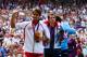 LONDON, ENGLAND - AUGUST 05: Silver medalist Roger Federer (L) of Switzerland, gold medalist Andy Murray (R) of Great Britain celebrate during the medal ceremony for the Men's Singles Tennis match on Day 9 of the London 2012 Olympic Games at the All England Lawn Tennis and Croquet Club on August 5, 2012 in London, England. Murray defeated Federer in the gold medal match in straight sets 2-6, 1-6, 4-6. (Photo by Clive Brunskill/Getty Images)