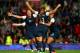 MANCHESTER, ENGLAND - AUGUST 06: Alex Morgan #13 of the United States celebrates with Sydney Leroux #11 and Abby Wambach (L) after she scored in extra time during the Women's Football Semi Final match between Canada and USA, on Day 10 of the London 2012 Olympic Games at Old Trafford on August 6, 2012 in Manchester, England. (Photo by Stanley Chou/Getty Images)