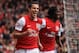 LONDON, ENGLAND - MAY 05: Robin van Persie of Arsenal celebrates scoring their third goal during the Barclays Premier League match between Arsenal and Norwich City at the Emirates Stadium on May 5, 2012 in London, England. (Photo by Bryn Lennon/Getty Images)