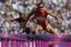 Aug 6, 2012; London, United Kingdom; Lolo Jones (USA) competes in the women's 100m hurdles heats during the 2012 London Olympic Games at Olympic Stadium. Mandatory Credit: Robert Deutsch-USA TODAY Sports