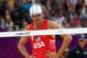 LONDON, ENGLAND - AUGUST 06: Jacob Gibb (playing partner of Sean Rosenthal) of the United States looks on dejected against Martins Plavins and Janis Smedins of Latvia during the Men's Beach Volleyball quarterfinal match between the United States and Latvia on Day 10 of the London 2012 Olympic Games at Horse Guards Parade August 6, 2012 in London, England. (Photo by Ryan Pierse/Getty Images)
