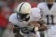 MADISON, WI - NOVEMBER 26: Silas Redd #25 of the Penn State Nittany Lions tries to move over Matt Stankiewitch #54 against the Wisconsin Badgers at Camp Randall Stadium on November 26, 2011 in Madison, Wisconsin. Wisconsin defeated Penn State 45-7. (Photo by Jonathan Daniel/Getty Images)