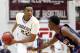Jan 16, 2012; Springfield, MA, USA; Chicago Simeon Wolverines forward Jabari Parker (22) holds the ball while being guarded by Findlay Pilots forward Winston Shepard (right) during the first half at Blake Arena. Mandatory Credit: Mark L. Baer-US PRESSWIRE