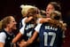 MANCHESTER, ENGLAND - AUGUST 06: Alex Morgan #13 of the United States celebrates with her team-mates after scoring the winning goal in extra time during the Women's Football Semi Final match between Canada and USA, on Day 10 of the London 2012 Olympic Games at Old Trafford on August 6, 2012 in Manchester, England. (Photo by Stanley Chou/Getty Images)