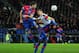 BASEL, SWITZERLAND - DECEMBER 07: Nemanja Vidic of Manchester United goes up for a header with David Abraham and Cabral of Basel uring the UEFA Champions League Group C match between FC Basel 1893 and Manchester United at St. Jakob-Park on December 7, 2011 in Basel, Switzerland. (Photo by Jamie McDonald/Getty Images)