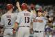 LOS ANGELES, CA - JULY 30: Miguel Montero #26 of the Arizona Diamondbacks celebrates with teammates Aaron Hill #2 and Jason Kubel #13 after scoring in the fifth inning against the Los Angeles Dodgers at Dodger Stadium on July 30, 2012 in Los Angeles, California. (Photo by Lisa Blumenfeld/Getty Images)