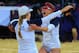 LONDON, ENGLAND - AUGUST 07: April Ross (R) of the United States and Jennifer Kessy of the United States celebrate after winning match point during the Women's Beach Volleyball Semi Final match between United States and Brazil on Day 11 of the London 2012 Olympic Games at Horse Guards Parade August 7, 2012 in London, England. (Photo by Michael Regan/Getty Images)