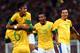 MANCHESTER, ENGLAND - AUGUST 07: Neymar of Brazil and Marcelo #6 celebrate the goal by Leandro Damiao #9 while Alex Sandro looks on during the Men's Football Semi Final match between Korea and Brazil, on Day 11 of the London 2012 Olympic Games at Old Trafford on August 7, 2012 in Manchester, England. (Photo by Stanley Chou/Getty Images)