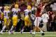 NEW ORLEANS, LA - JANUARY 09: AJ McCarron #10 of the Alabama Crimson Tide celebrates a 34-yard touchdown run by Trent Richardson #3 in the fourth quarter against the Louisiana State University Tigers during the 2012 Allstate BCS National Championship Game at Mercedes-Benz Superdome on January 9, 2012 in New Orleans, Louisiana. (Photo by Chris Graythen/Getty Images)
