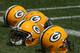 GREEN BAY, WI - AUGUST 03: Helmets sit on the field during the Green Bay Packers practice at summer training camp on August 3, 2009 at the Ray Nitschke Field in Green Bay, Wisconsin. (Photo by Jonathan Daniel/Getty Images)