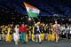 LONDON, ENGLAND - JULY 27: Sushil Kumar of the India Olympic wrestling team carries his country's flag during the Opening Ceremony of the London 2012 Olympic Games at the Olympic Stadium on July 27, 2012 in London, England. (Photo by Cameron Spencer/Getty Images)