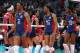 LONDON, ENGLAND - AUGUST 07: Danielle Scott-Arruda #2 of the United States and the rest of her teammates shake hands with the Dominican Republic after the match during Women's Volleyball quarterfinals on Day 11 of the London 2012 Olympic Games at Earls Court on August 7, 2012 in London, England. (Photo by Elsa/Getty Images)