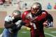 April 14, 2012; Tallahassee, FL, USA; Florida State Seminoles running back Mario Pender (7) runs the ball past defensive end Brandon Jenkins (4) during the second half of the Florida State spring game at Doak Campbell Stadium. Mandatory Credit: Melina Vastola-US PRESSWIRE