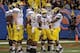 NEW ORLEANS, LA - JANUARY 03: Quarterback Denard Robinson #16 (R) of the Michigan Wolverines calls a play in the offensive huddle against the Virginia Tech Hokies during the Allstate Sugar Bowl at Mercedes-Benz Superdome on January 3, 2012 in New Orleans, Louisiana. (Photo by Chris Graythen/Getty Images)