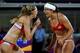 LONDON, ENGLAND - AUGUST 08: Kerri Walsh Jennings (L) and Misty May-Treanor of the United States celebrates winning the Gold medal in the Women's Beach Volleyball Gold medal match against the United States on Day 12 of the London 2012 Olympic Games at the Horse Guard's Parade on August 8, 2012 in London, England. (Photo by Cameron Spencer/Getty Images)