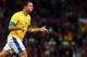 MANCHESTER, ENGLAND - AUGUST 07: Leandro Damiao of Brazil reacts after scoring during the Men's Football Semi Final match between Korea and Brazil, on Day 11 of the London 2012 Olympic Games at Old Trafford on August 7, 2012 in Manchester, England. (Photo by Stanley Chou/Getty Images)