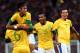 MANCHESTER, ENGLAND - AUGUST 07: Neymar of Brazil and Marcelo #6 celebrate the goal by Leandro Damiao #9 while Alex Sandro looks on during the Men's Football Semi Final match between Korea and Brazil, on Day 11 of the London 2012 Olympic Games at Old Trafford on August 7, 2012 in Manchester, England. (Photo by Stanley Chou/Getty Images)