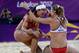 LONDON, ENGLAND - AUGUST 08: Kerri Walsh Jennings (R) and Misty May-Treanor of the United States celebrate winning the Gold medal in the Women's Beach Volleyball Gold medal match against the United States on Day 12 of the London 2012 Olympic Games at the Horse Guard's Parade on August 8, 2012 in London, England. (Photo by Jamie Squire/Getty Images)