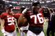 Alabama OL D.J. Fluker (right)