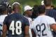 LAKE FOREST, IL - JUNE 12: Head coach Lovie Smith of the Chicago Bears talks to players following a minicamp practice at Halas Hall on June 12, 2012 in Lake Forest, Illinois. (Photo by Jonathan Daniel/Getty Images)