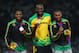 LONDON, ENGLAND - AUGUST 09: (L-R) Silver medalist Yohan Blake of Jamaica, gold medalist Usain Bolt of Jamaica and bronze medalist Warren Weir of Jamaica pose on the podium during the medal ceremony for the Men's 200m on Day 13 of the London 2012 Olympic Games at Olympic Stadium on August 9, 2012 in London, England.. (Photo by Cameron Spencer/Getty Images)