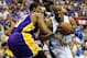 ORLANDO, FL - JUNE 14: Dwight Howard #12 of the Orlando Magic drives on Andrew Bynum #17 of the Los Angeles Lakers in the third quarter of Game Five of the 2009 NBA Finals on June 14, 2009 at Amway Arena in Orlando, Florida. NOTE TO USER: User expressly acknowledges and agrees that, by downloading and or using this photograph, User is consenting to the terms and conditions of the Getty Images License Agreement. (Photo by Ronald Martinez/Getty Images)