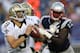 FOXBORO, MA - AUGUST 9: Drew Brees #9 of the New Orleans Saints is chased by Chandler Jones #95 of the New England Patriots in the first half at Gillette Stadium on August 9, 2012 in Foxboro, Massachusetts. (Photo by Jim Rogash/Getty Images)
