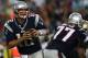 FOXBORO, MA - AUGUST 9: Tom Brady #12 of the New England Patriots looks for an open man against the New Orleans Saints in the first half at Gillette Stadium on August 9, 2012 in Foxboro, Massachusetts. (Photo by Jim Rogash/Getty Images)