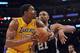 LOS ANGELES, CA - APRIL 17: Andrew Bynum #17 of the Los Angeles Lakers turns to the basket in front of Tim Duncan #21 of the San Antonio Spurs at Staples Center on April 17, 2012 in Los Angeles, California. NOTE TO USER: User expressly acknowledges and agrees that, by downloading and or using this photograph, User is consenting to the terms and conditions of the Getty Images License Agreement. (Photo by Harry How/Getty Images)
